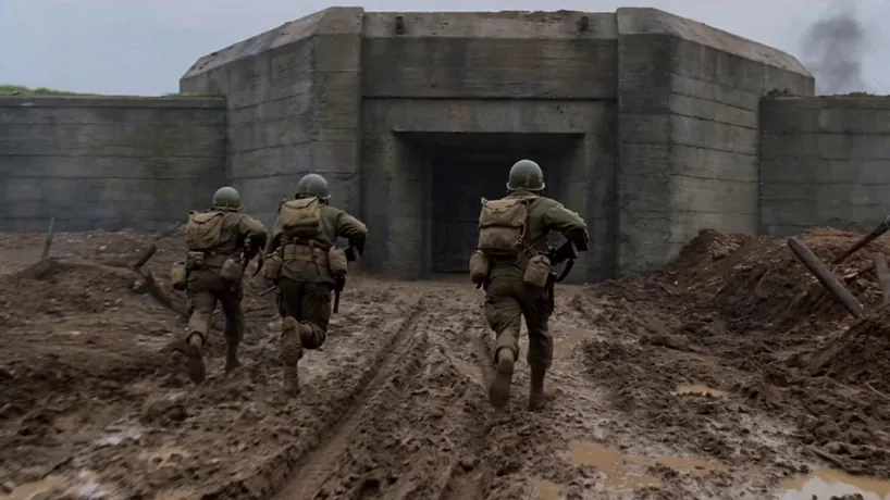 Gritty WWII combat VFX, shot on Arri Alexa 35 with 35mm film grain, featuring high-contrast lighting, volumetric smoke, and a frantic, immersive battle rhythm.
S1: Wide handheld tracking shot following Allied soldiers sprinting through a mud-caked battlefield toward a massive concrete bunker under heavy artillery fire.
S2: Extreme close-up of a soldier’s face covered in grime and sweat, followed by a rapid POV of a satchel charge exploding against the reinforced steel door.
S3: Low-angle steady-cam shot entering the breach, capturing rhythmic muzzle flashes and flying debris as infantry push through thick, billowing grey smoke.
S4: Wide crane shot rising above the fortress as a massive internal explosion erupts, silhouetting a triumphant soldier planting a tattered flag amidst the falling embers.