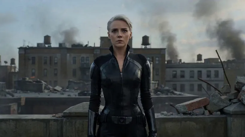 15s cinematic sci-fi transformation sequence shot on Arri Alexa 65. The video begins with a cool-toned, determined young women warrior with short silver hair in a sleek black leather suit standing on a war-torn rooftop, debris and smoke filling the sky. As she engages her high-tech waist belt, violet energy surges through her eyes. A mechanical morphing sequence occurs, with glowing circuits and white, purple-accented metallic armor plating assembling over her body through a burst of electrical particles. The camera pans and zooms dynamically, capturing the transition from human to armored fighter. The scene concludes with the armored warrior standing in a combat-ready pose amidst the urban ruins. The lighting is dramatic and moody, with a tense, heroic orchestral score building in intensity throughout the transformation.