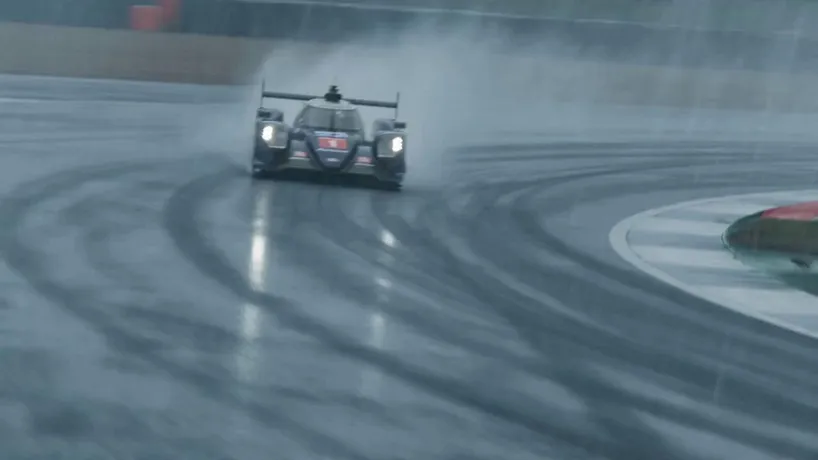Cinematic VFX racing sequence shot on Arri Alexa 35 with anamorphic lenses featuring a low-profile tracking shot following a high-performance race car tearing through a rain-drenched circuit at extreme speeds. As the engine roars, the scene shifts into a hyper-realistic bullet-time sequence where time slows to a crawl, capturing millions of crystalline rain droplets suspended in mid-air around the aerodynamic chassis. The camera orbits the vehicle showing Surface water ripples in slow motion against the tires before time suddenly snaps back to full speed with a thunderous exhaust note as the car vanishes into a misty blur of taillights. The atmosphere is immersive and high-octane, characterized by a rhythmic transition from chaotic motion to frozen elegance, ending with an explosive sense of momentum.